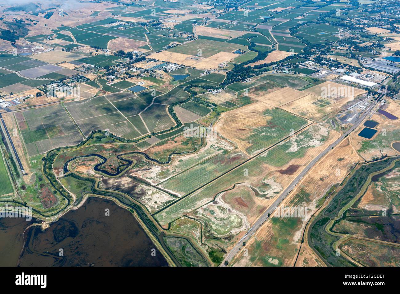 Aerial view of patterns and colors of the river delta and farm fields Stock Photo
