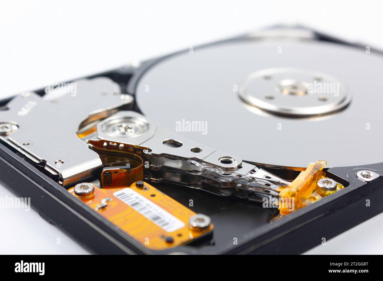 Hard drive, open, interior with trays and head, on white background
