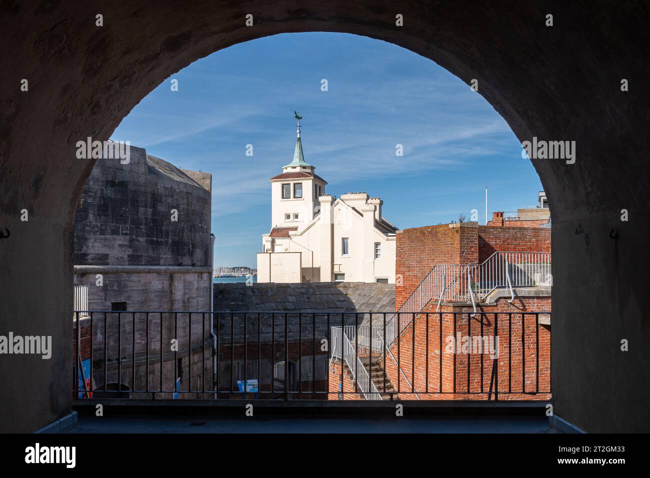 View through an arch of the Round Tower, part of the Tudor fortifications of Old Portsmouth city, Hampshire, England, UK Stock Photo