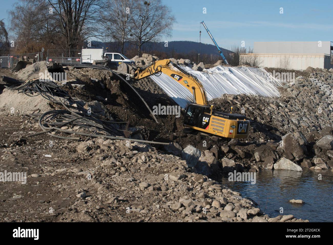 an excavator from the Caterpillar brand in the construction works ...