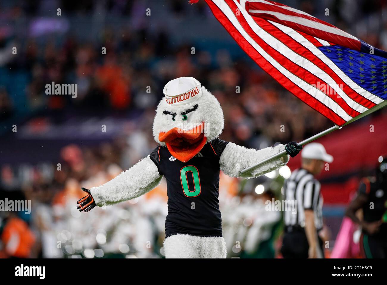 The Miami Hurricanes mascot leads the team out to the field prior to a college football regular season game against the Georgia Tech Yellow Jackets, S Stock Photo