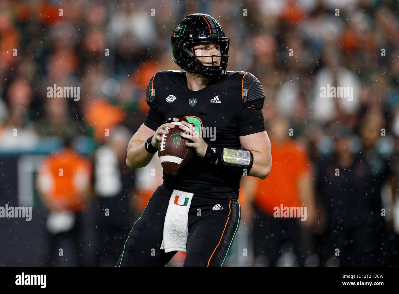 Miami Hurricanes quarterback Tyler Van Dyke (9) looks for an open receiver during a college football regular season game against the Georgia Tech Yell Stock Photo