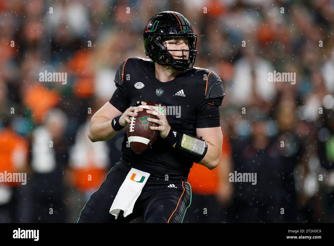 Miami Hurricanes quarterback Tyler Van Dyke (9) looks for an open receiver during a college football regular season game against the Georgia Tech Yell Stock Photo