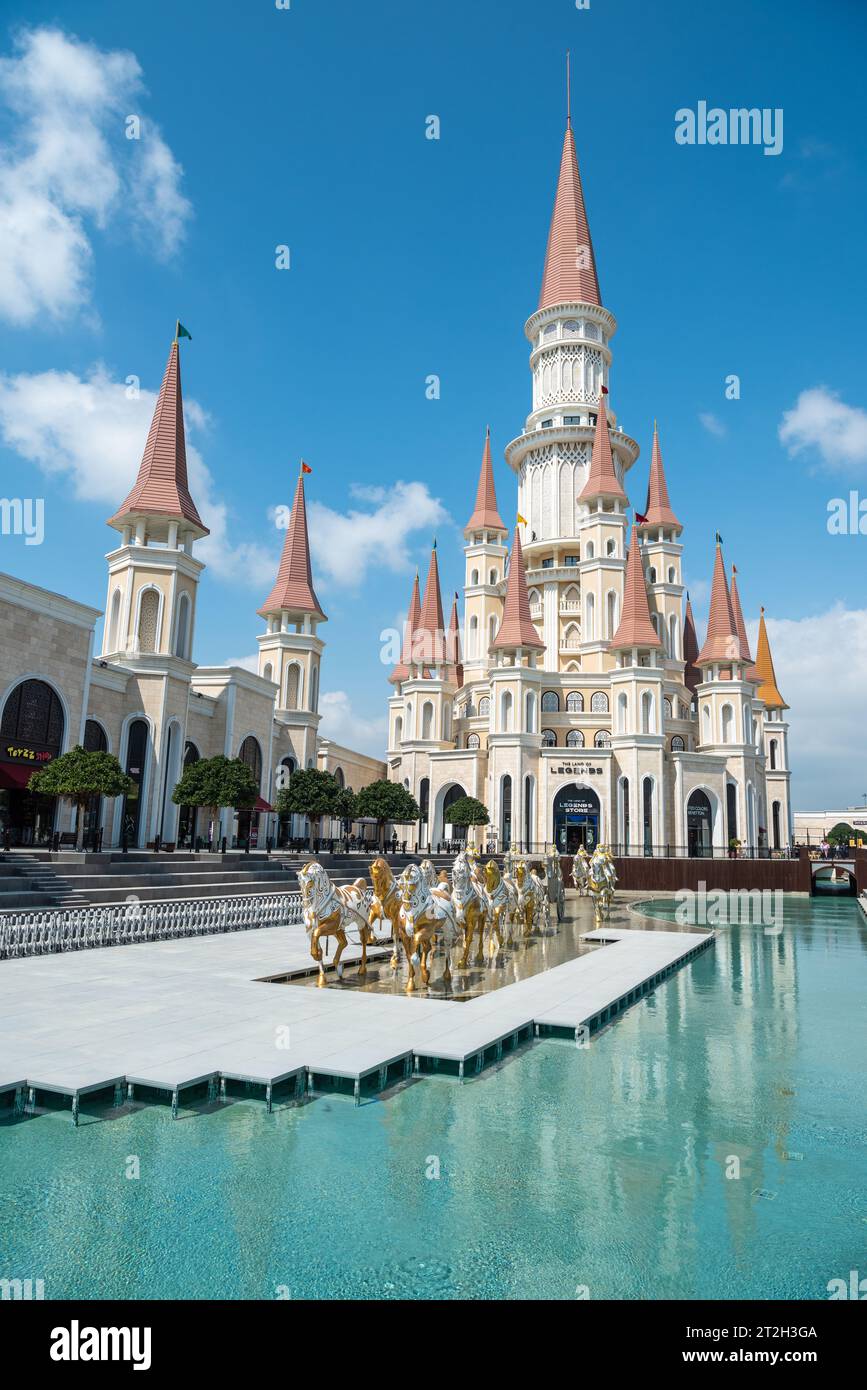Belek, Antalya, Turkey - March 27, 2023. The Chateau building at the Land of Legends theme park in Belek, Turkey. View with a pool and chariot monumen Stock Photo