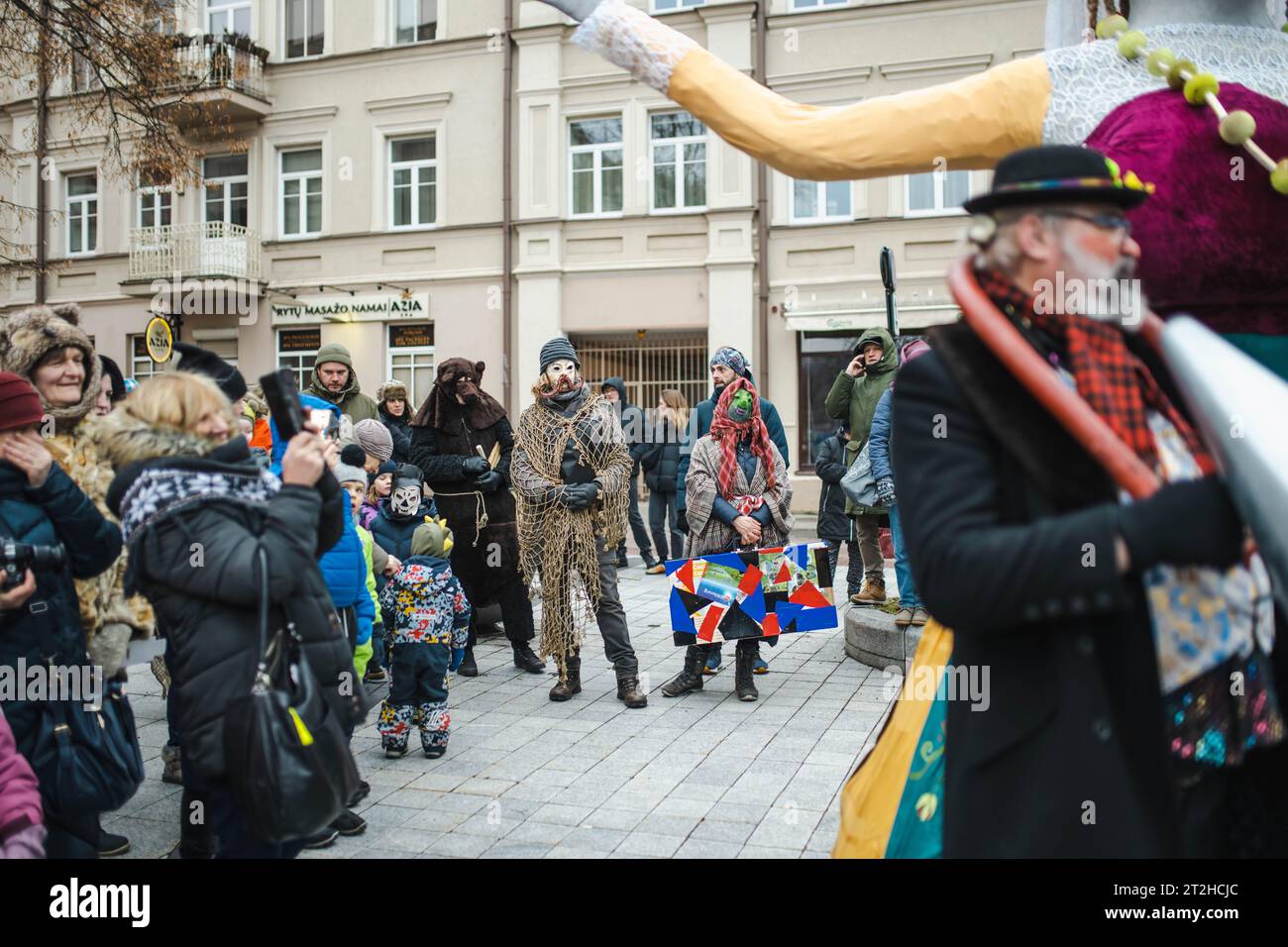 VILNIUS, LITHUANIA - FEBRUARY 21, 2023: Hundreds of people celebrating Uzgavenes, a Lithuanian annual folk festival taking place before Easter. Partic Stock Photo