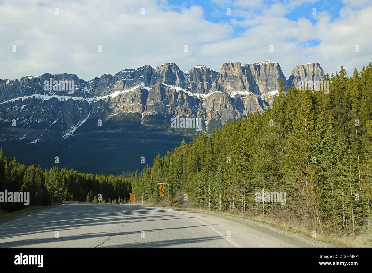 The road and Castle Mountain, Canada Stock Photo