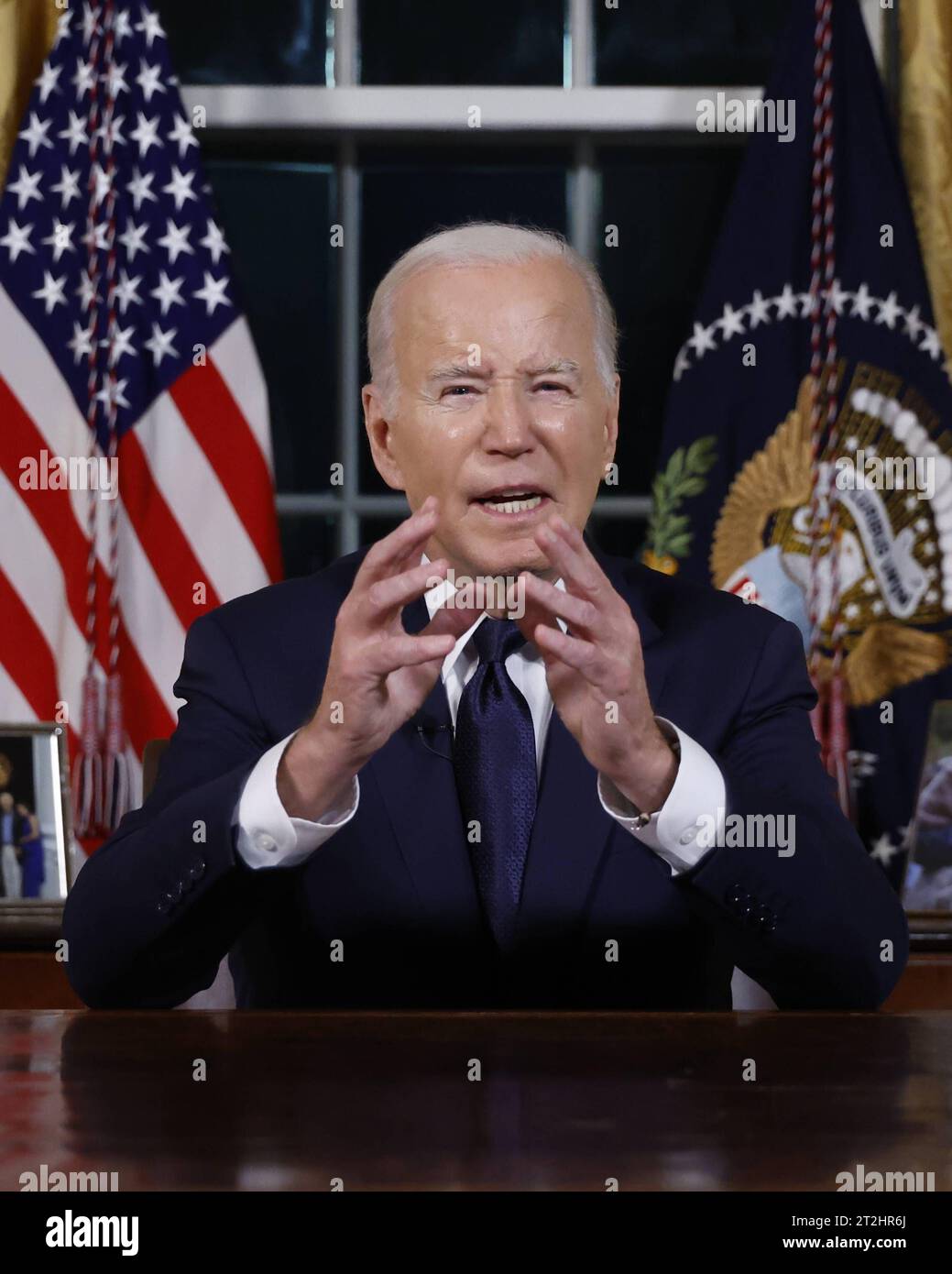 US President Joe Biden delivers a prime-time address to the nation about his approaches to the conflict between Israel and Hamas, humanitarian assistance in Gaza and continued support for Ukraine in their war with Russia, from the Oval Office of the White House in Washington, U.S. October 19, 2023. Copyright: xJonathanxErnstx/xPoolxviaxCNPx/MediaPunchx Credit: Imago/Alamy Live News Stock Photo