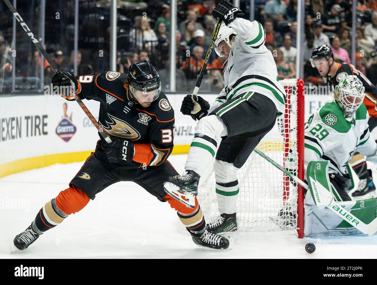 Anaheim Ducks center Sam Carrick (39) and Dallas Stars defenseman Miro