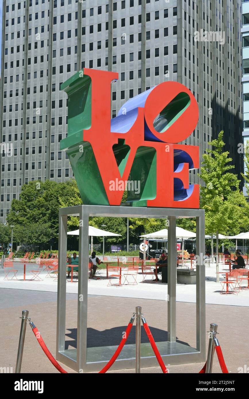 The brightly colored outdoor Love public sculpture in Love Park, in Philadelphia, Pennsylvania Stock Photo