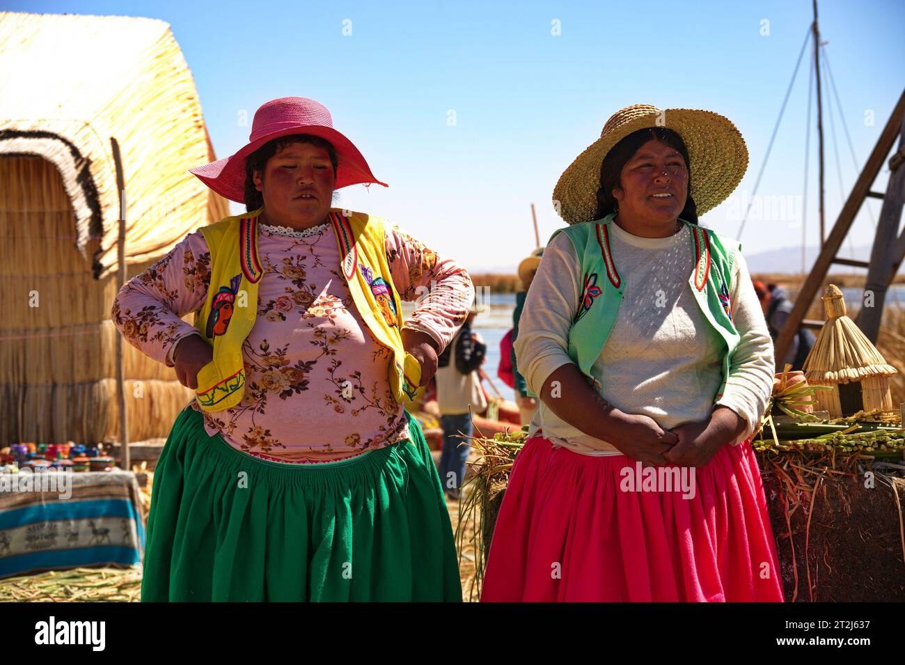 Portrait of inhabitants of the floating islands on Lake Titicaca, Peru Stock Photo