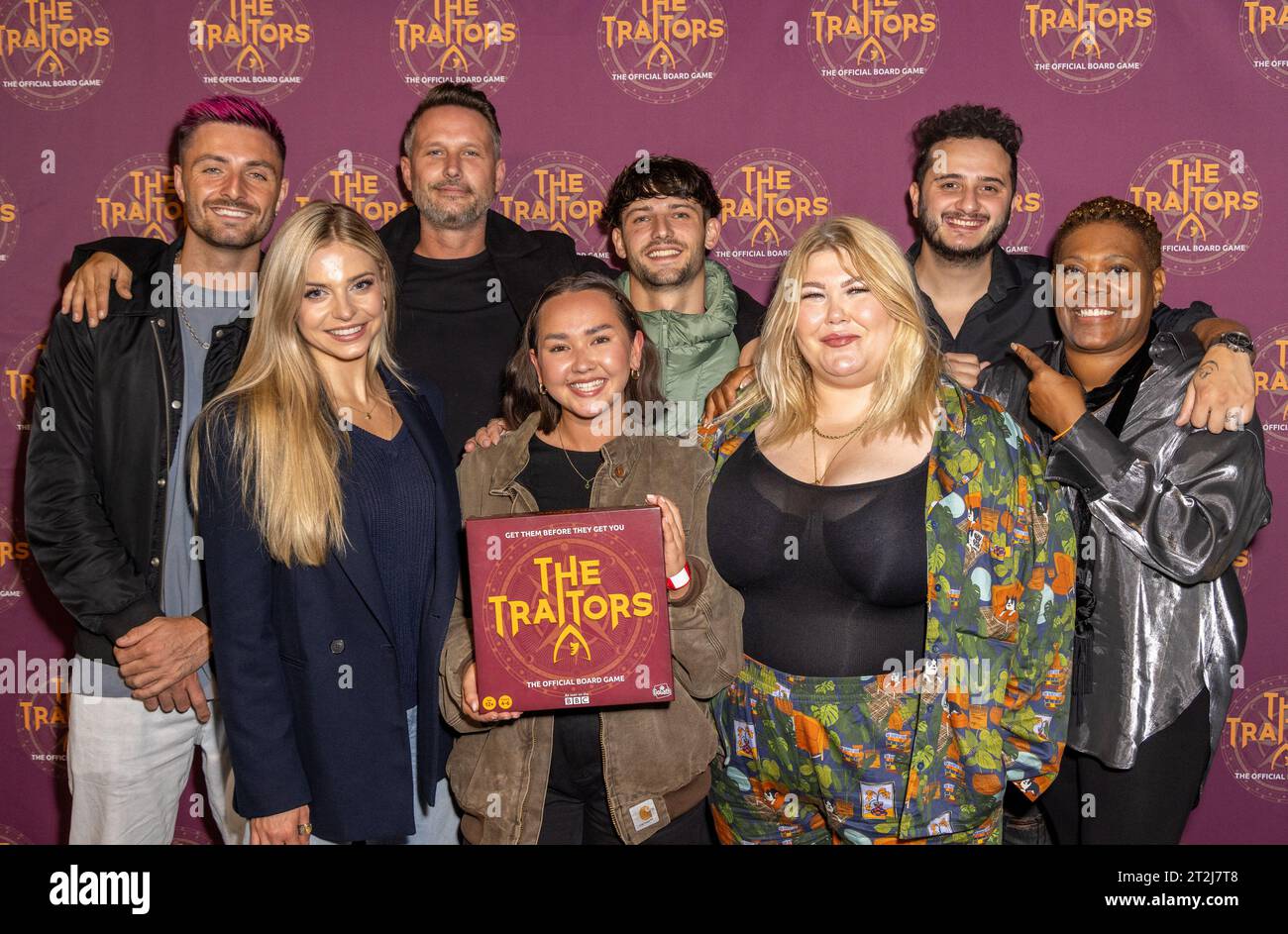London, UK. 19th Oct, 2023. The Traitor contestants from Season One, (Back L to R, Tom Elderfield, Kieran Tompsett, Matt Harris, Wilfred Webster, Front, L to R, Alex Gray, Alyssa Chan, Hannah Byczkowski, Fay Greaves attend The Official 'The Traitors' Board Game VIP Launch at the London Dungeon in London. (Photo by Phil Lewis/SOPA Images/Sipa USA) Credit: Sipa USA/Alamy Live News Stock Photo