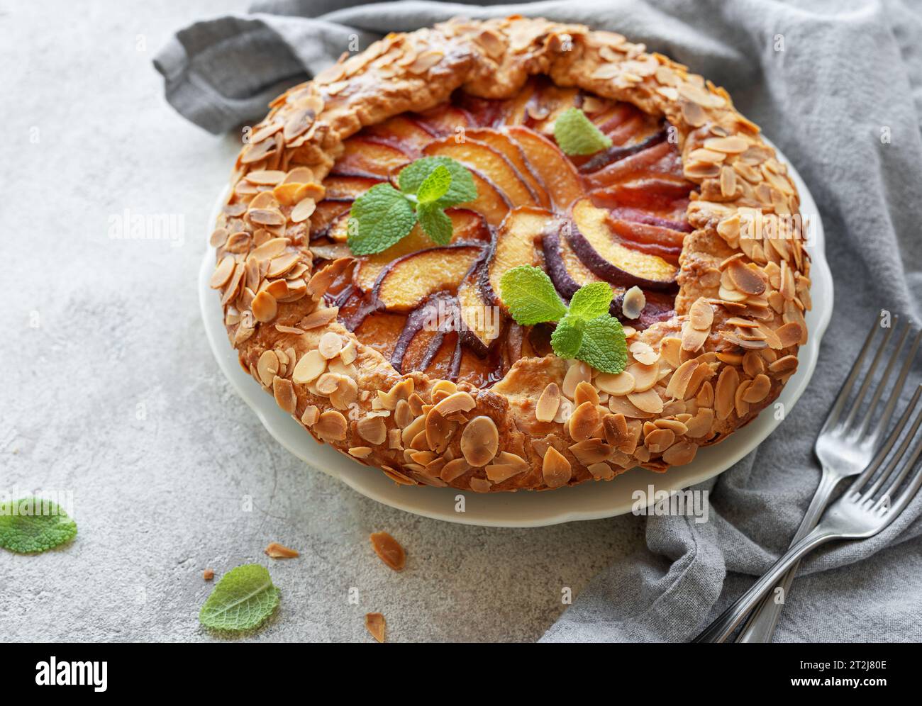 Homemade galette with peaches. Homemade open pie with fresh fruits ...
