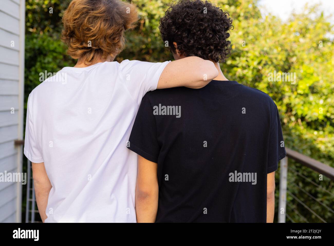 Rear view of men hi-res stock photography and images - Alamy