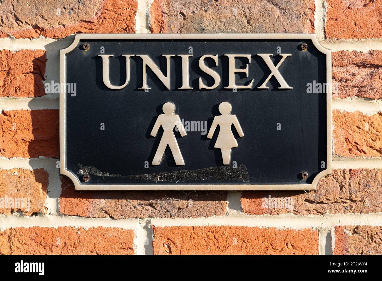 Unisex toilet sign for men and women, UK Stock Photo Alamy
