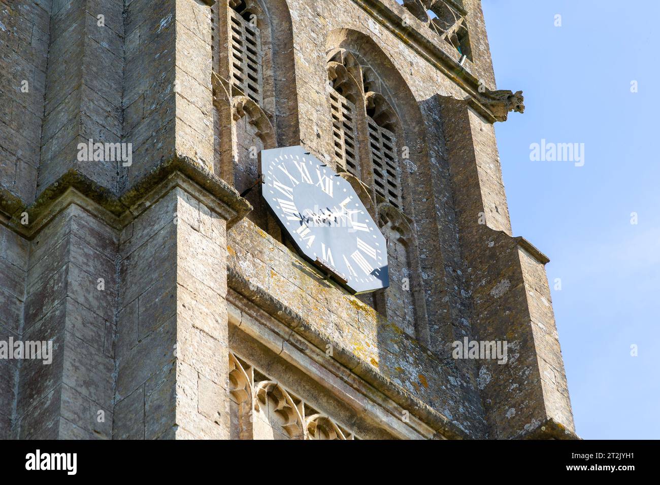 Clock with only one hand on tower of village church, Colerne, Wiltshire, England, UK Stock Photo