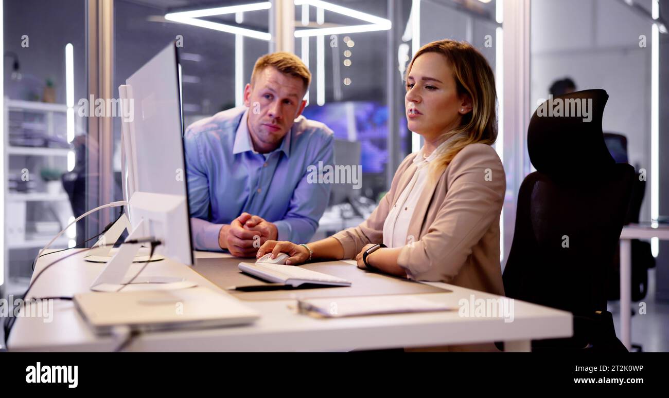 Analyst Working With Spreadsheet Business Data On Computer Stock Photo