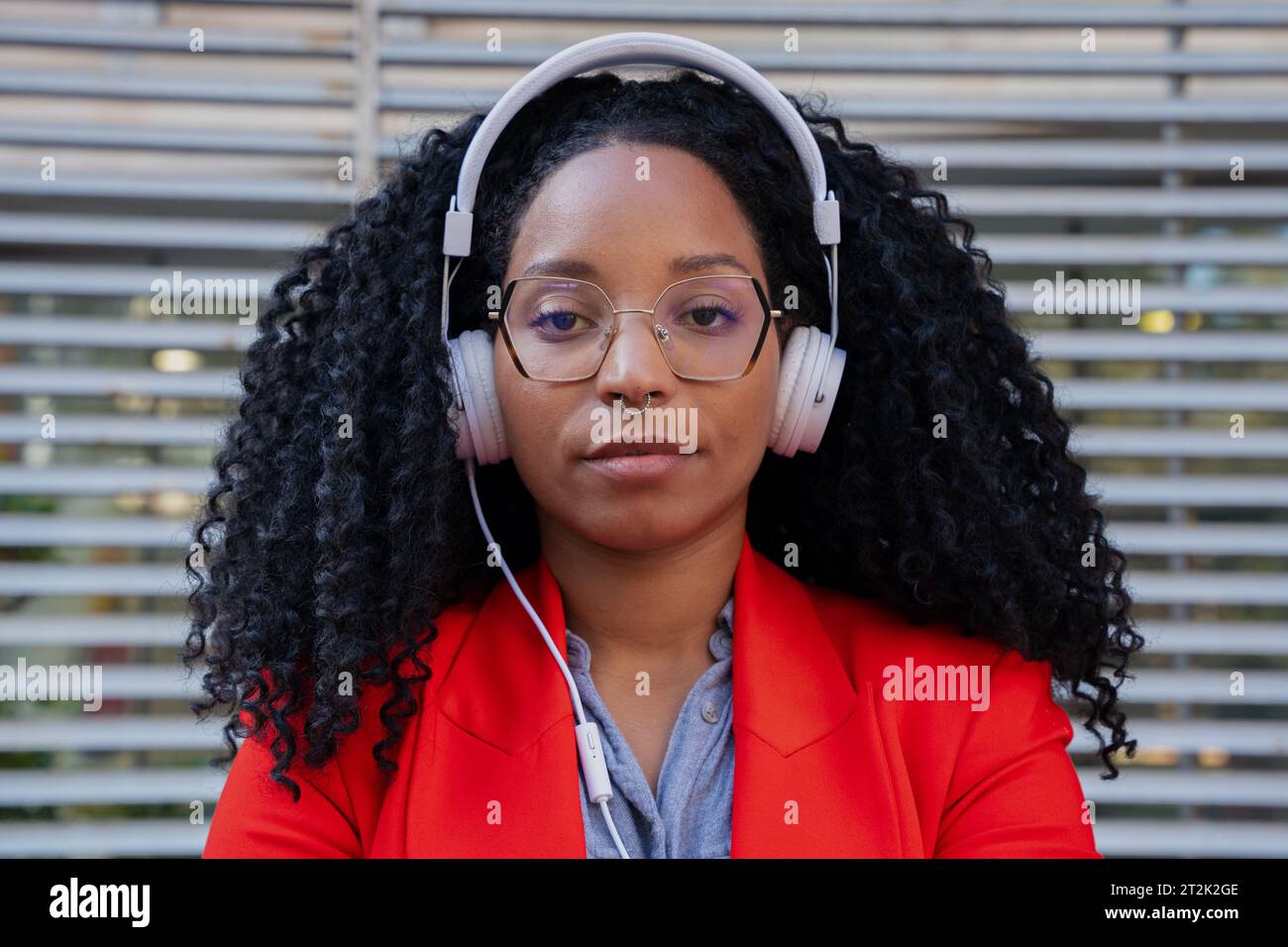 Individual close up of African American businesswoman standing in office Stock Photo