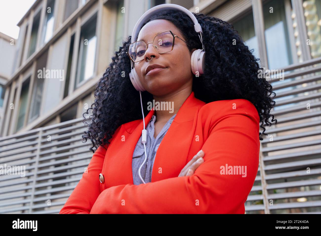 Individual close up portrait of African American businesswoman standing outdoors Stock Photo