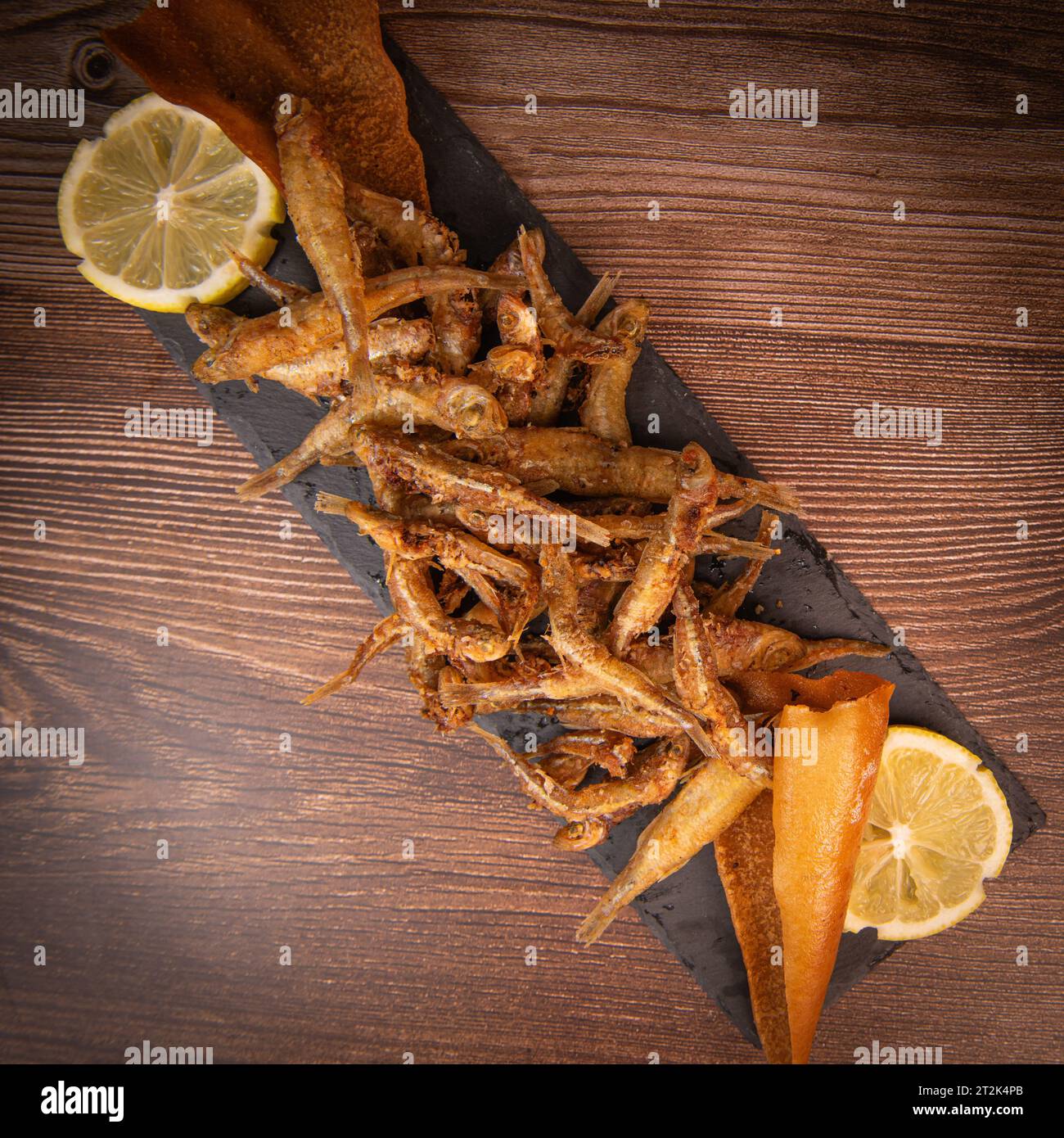 DEEP FRIED SEEFOOD, RECIPE FOR FISH, Smelt AND FRIED PITA, LEMON Stock