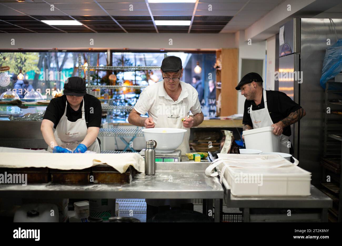 Staff at the Big River bakery in Newcastle, founded by Andy Haddon. A small-batch bakery which serves the local community and also runs employability Stock Photo