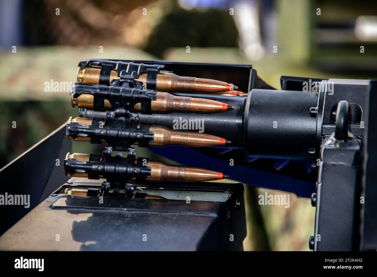 Close up of of bullets 11,8mm caliber in a coaxial machine gun, exposed at Military equipment international exhibition in Belgrade Stock Photo