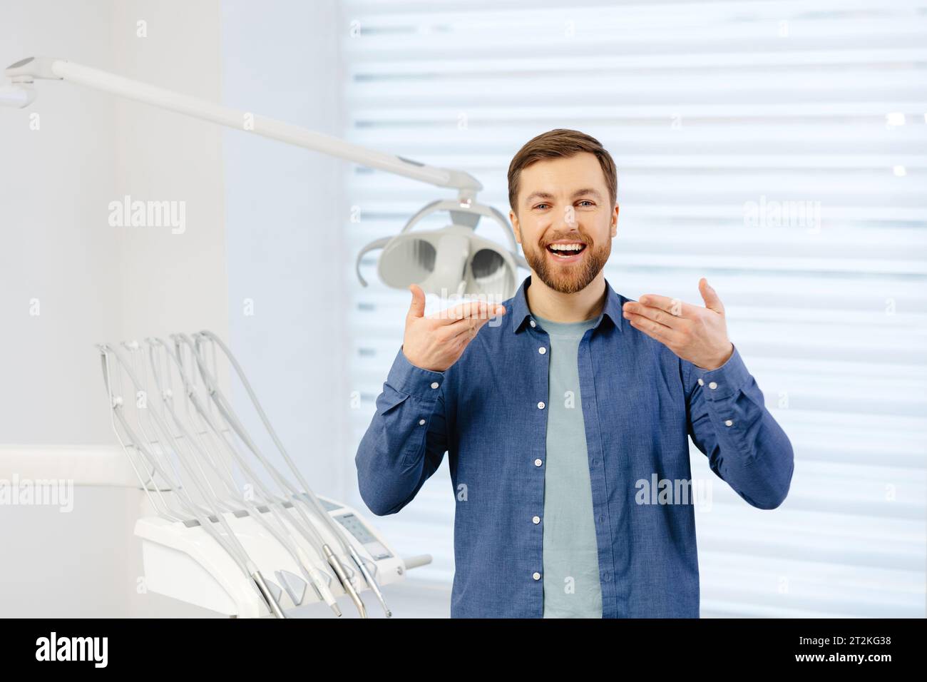 Toothy smile standing hi-res stock photography and images - Alamy