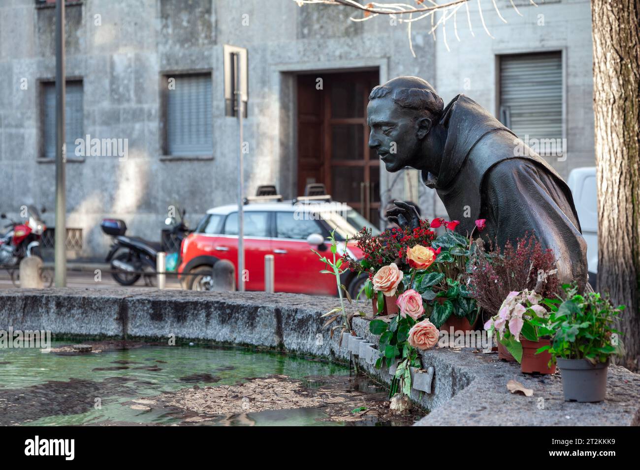 The fountain of San Francesco di Castiglioni, in the Piazza de Sant'Angelo, in Milan, Italy, Europe. The sculpture represents San Francis of Assisi. Stock Photo