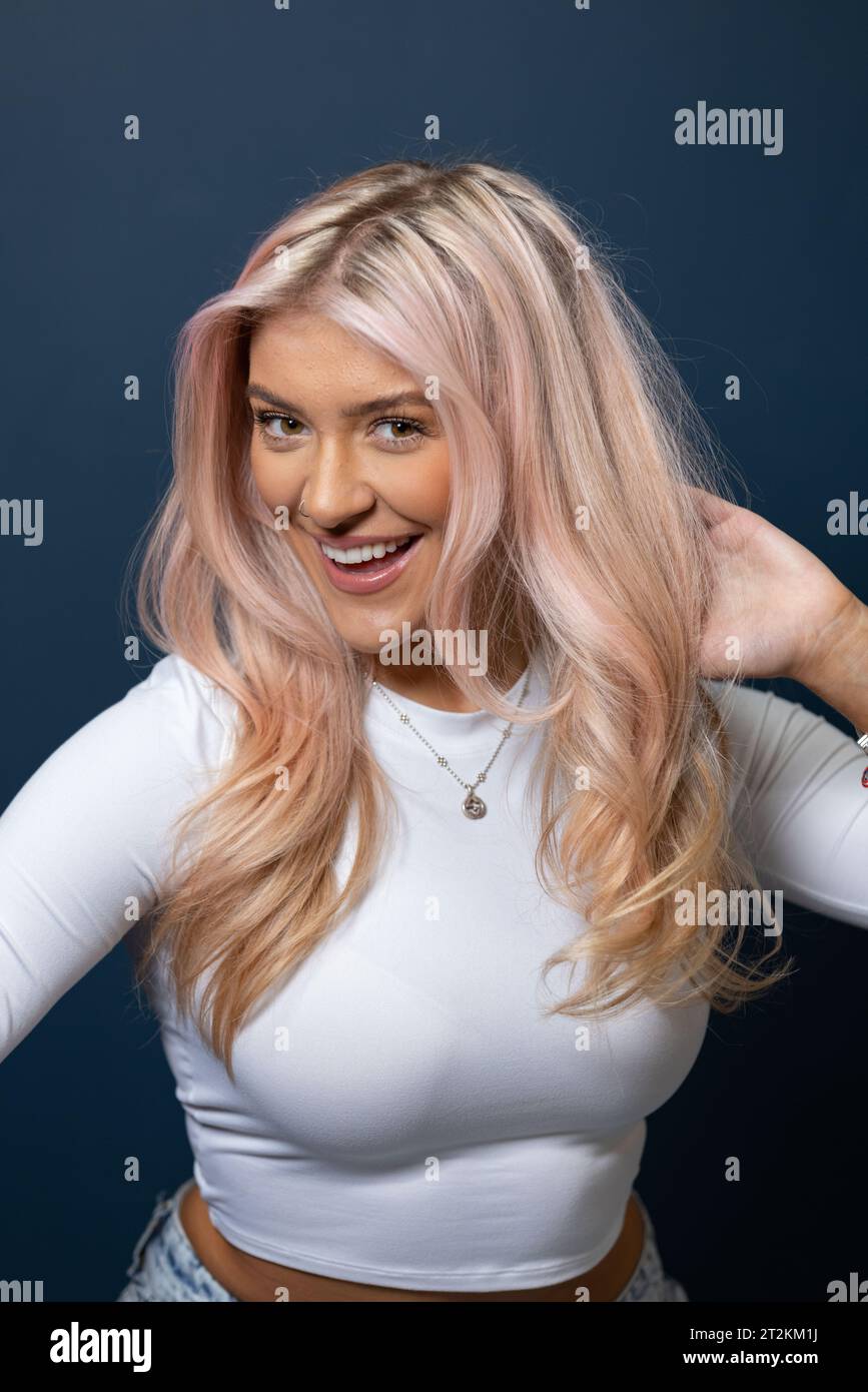 Molly Marsh 22-year-old musical theatre performer and social media creator from Doncaster on shoot for Children With Cancer charity at Studio64, Soho. Stock Photo