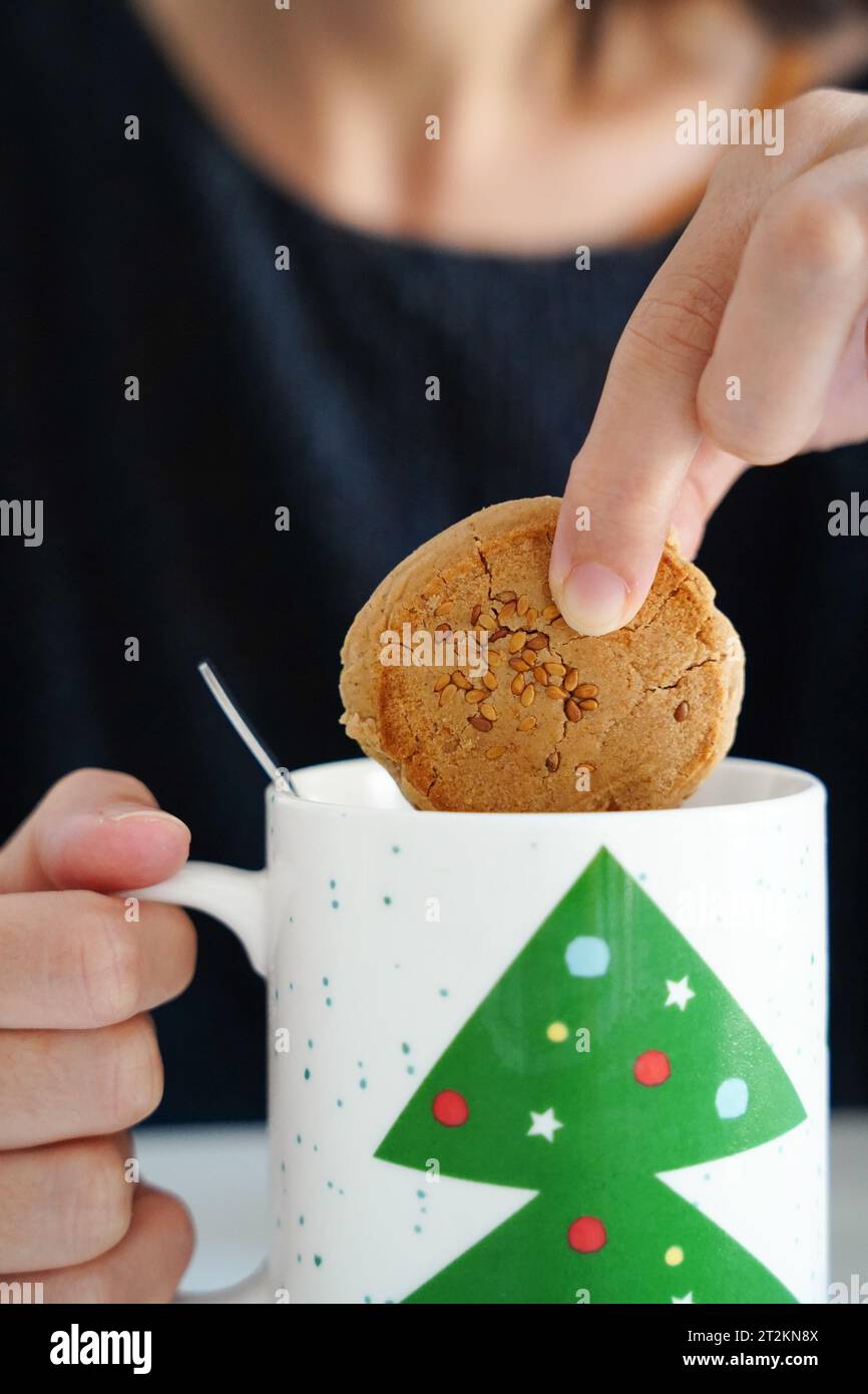 typical spanish dessert at christmastime in the cup with christmas tree. Stock Photo
