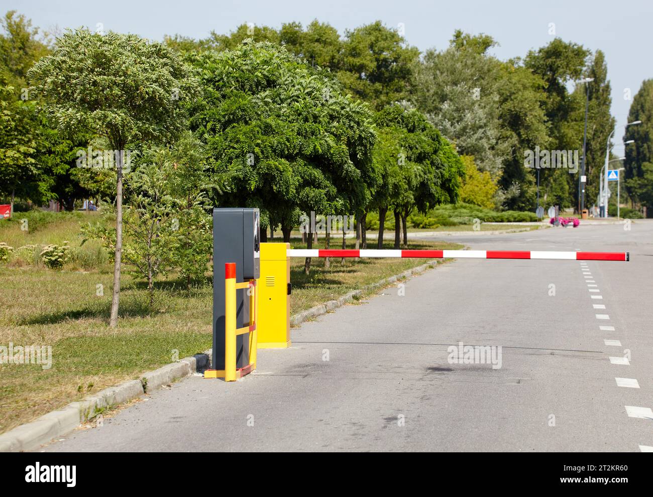 Closed automatic gate of the barrier. Automatic security system, entrance to the territory Stock Photo