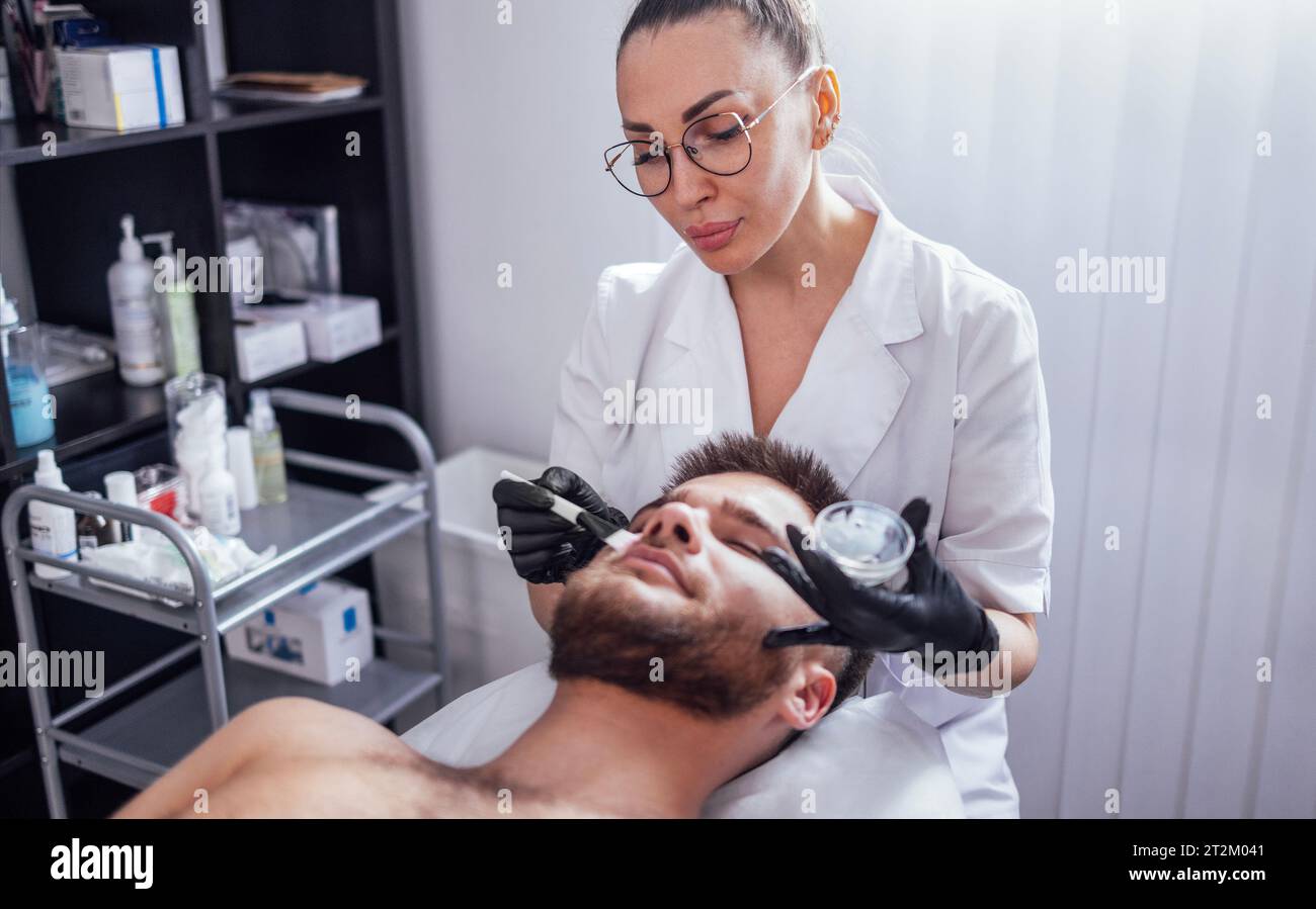Beautician applies gel hi-res stock photography and images - Alamy