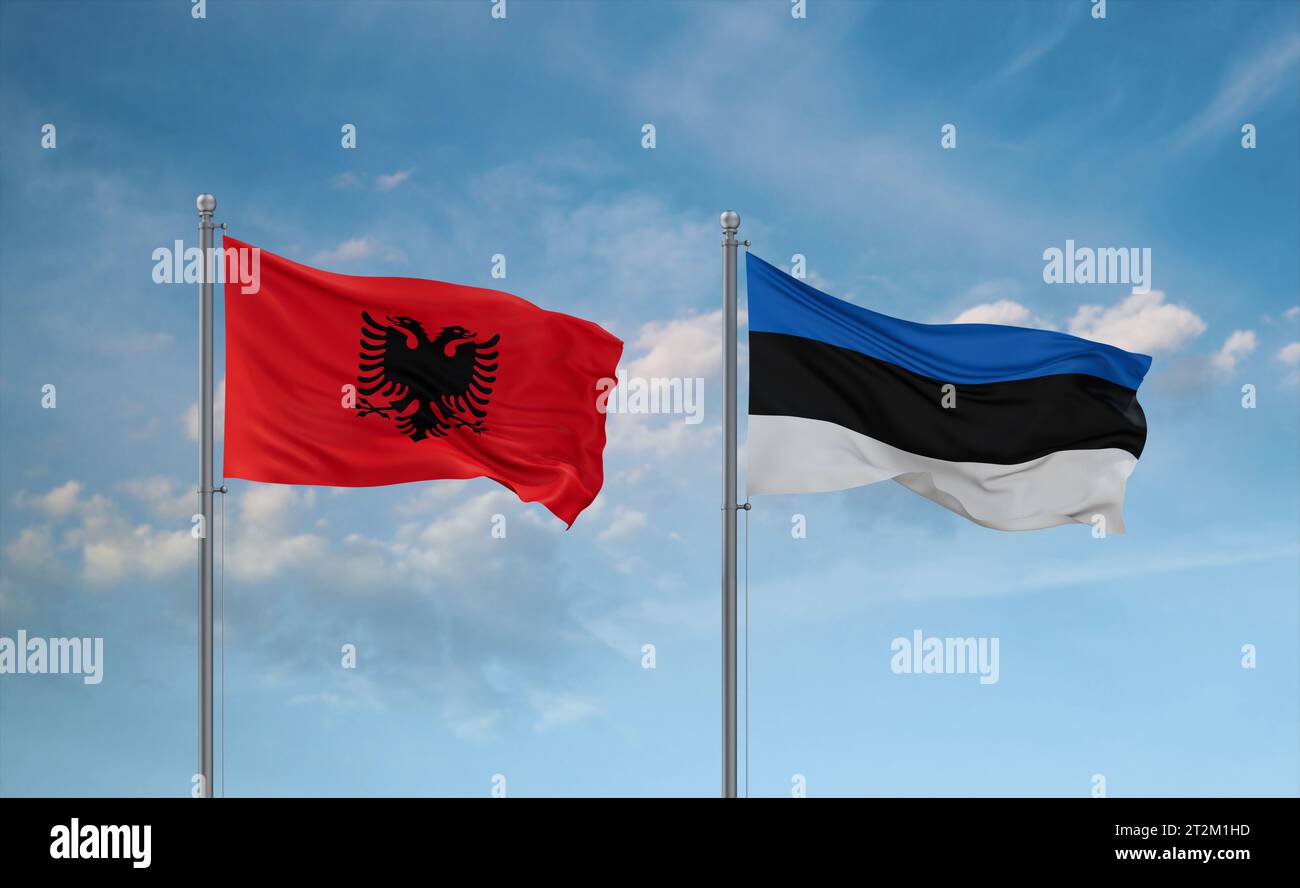 Estonia and Albania flags waving together on blue cloudy sky, two ...