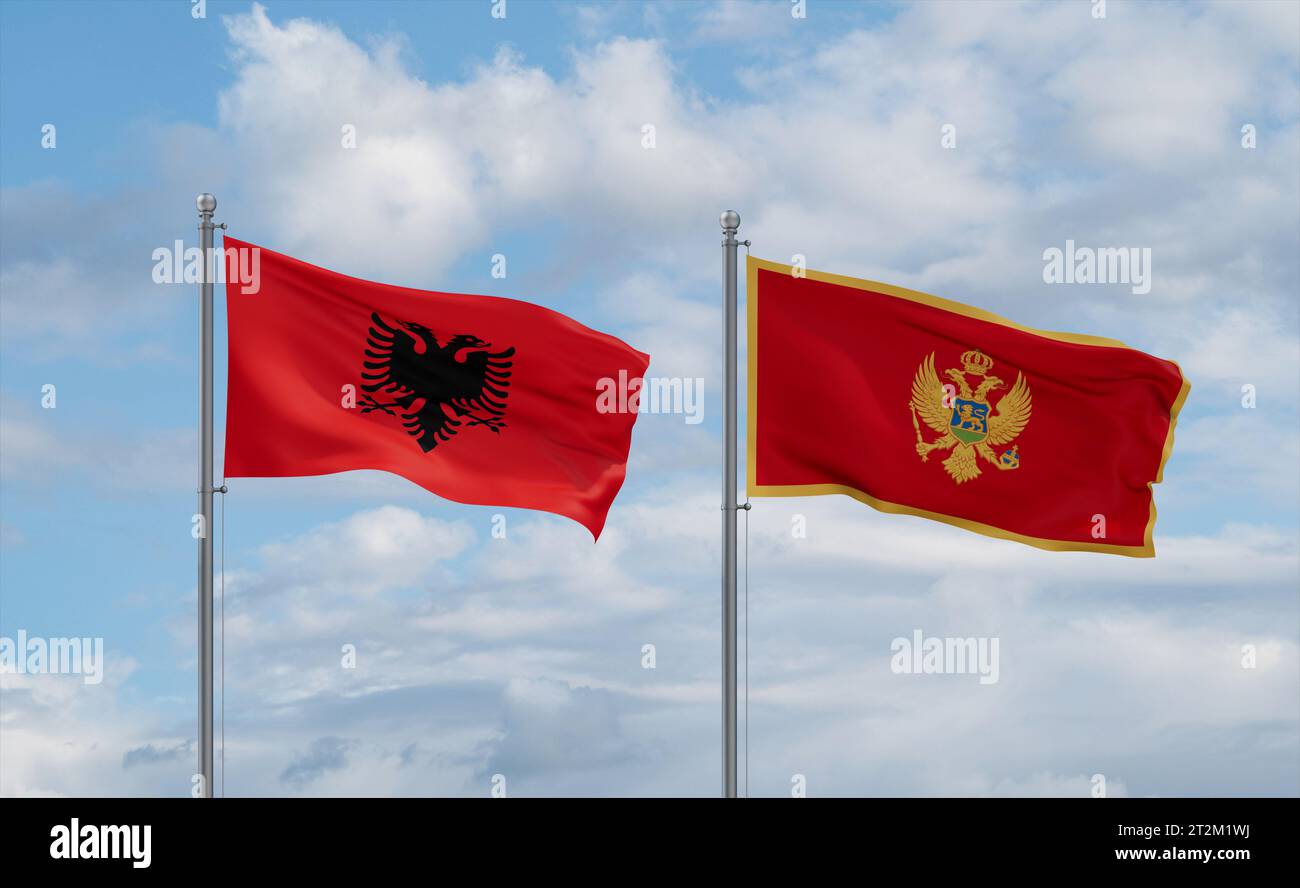 Montenegro and Albania flags waving together in the wind on blue cloudy ...
