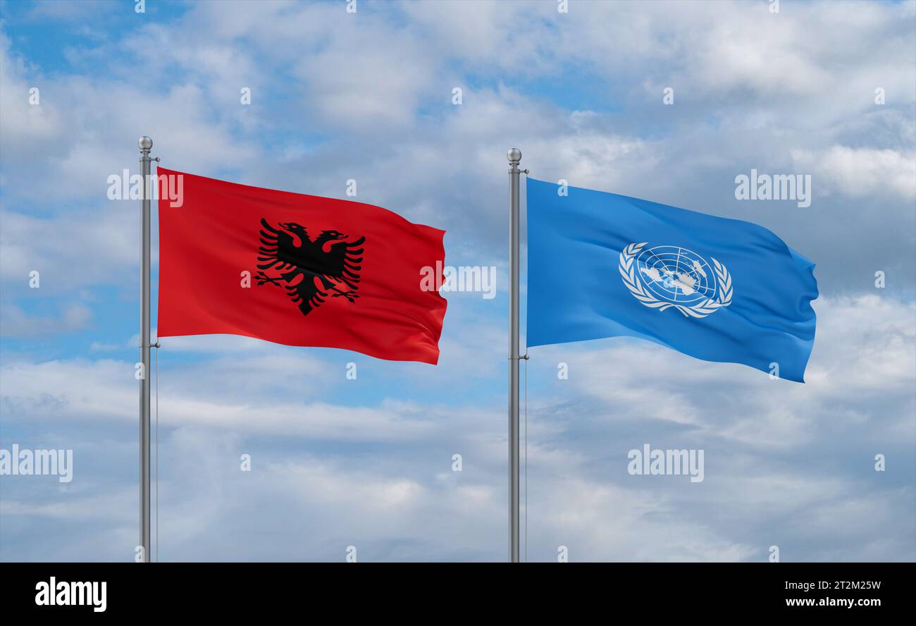 United Nations and Albania flags waving together in the wind on blue ...