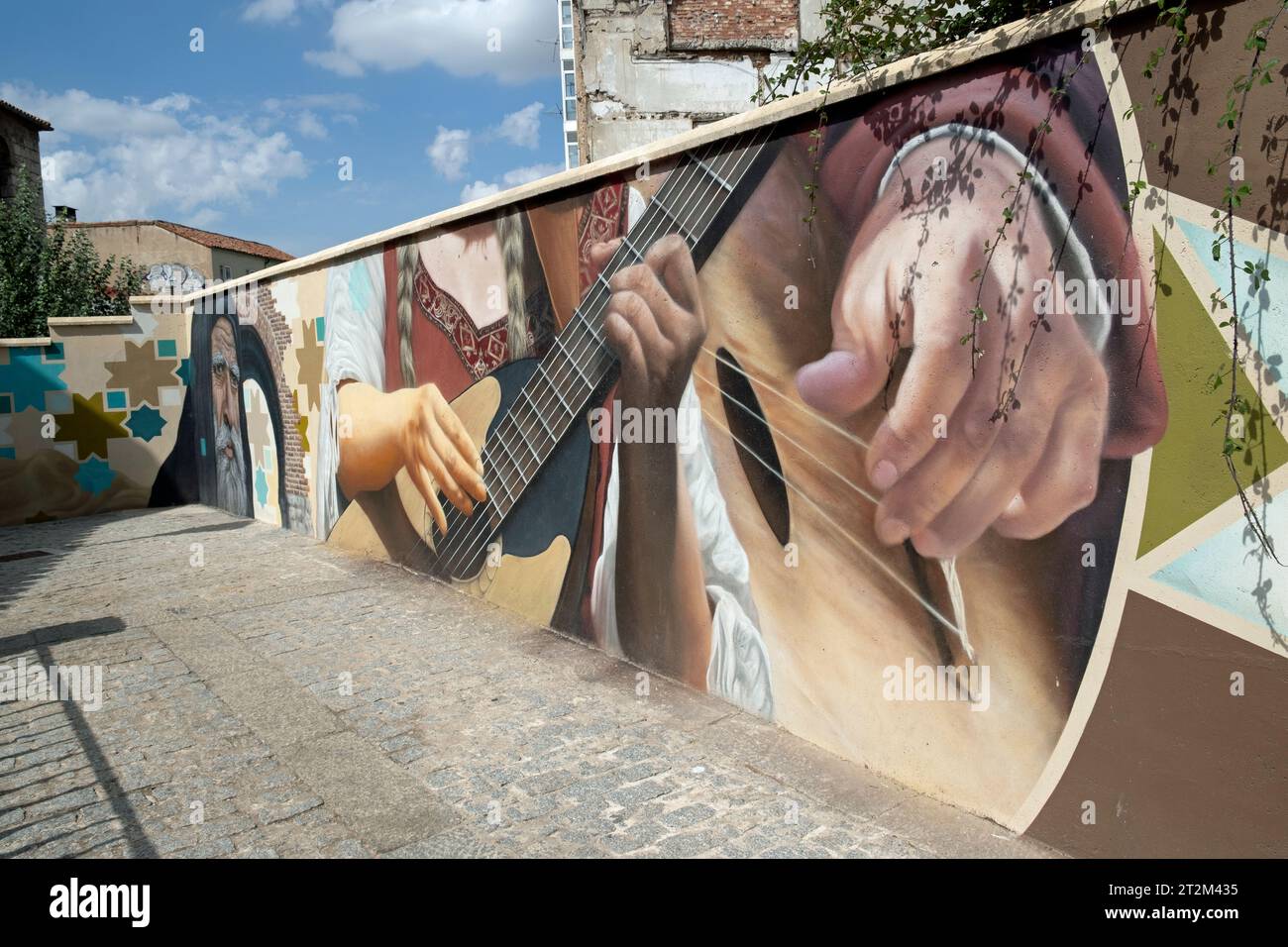 Street art entitled 'El Callejón de las Brujas' by urban artists Christian Fernandez Vicario and  Christian Saldaña. Burgos, Spain. Stock Photo