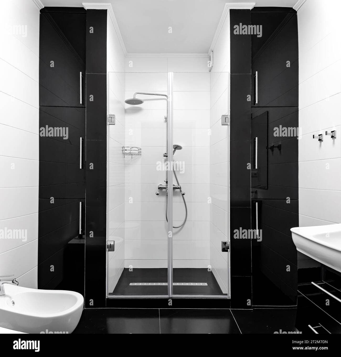 Shower cubicle in the bathroom with black on the edges