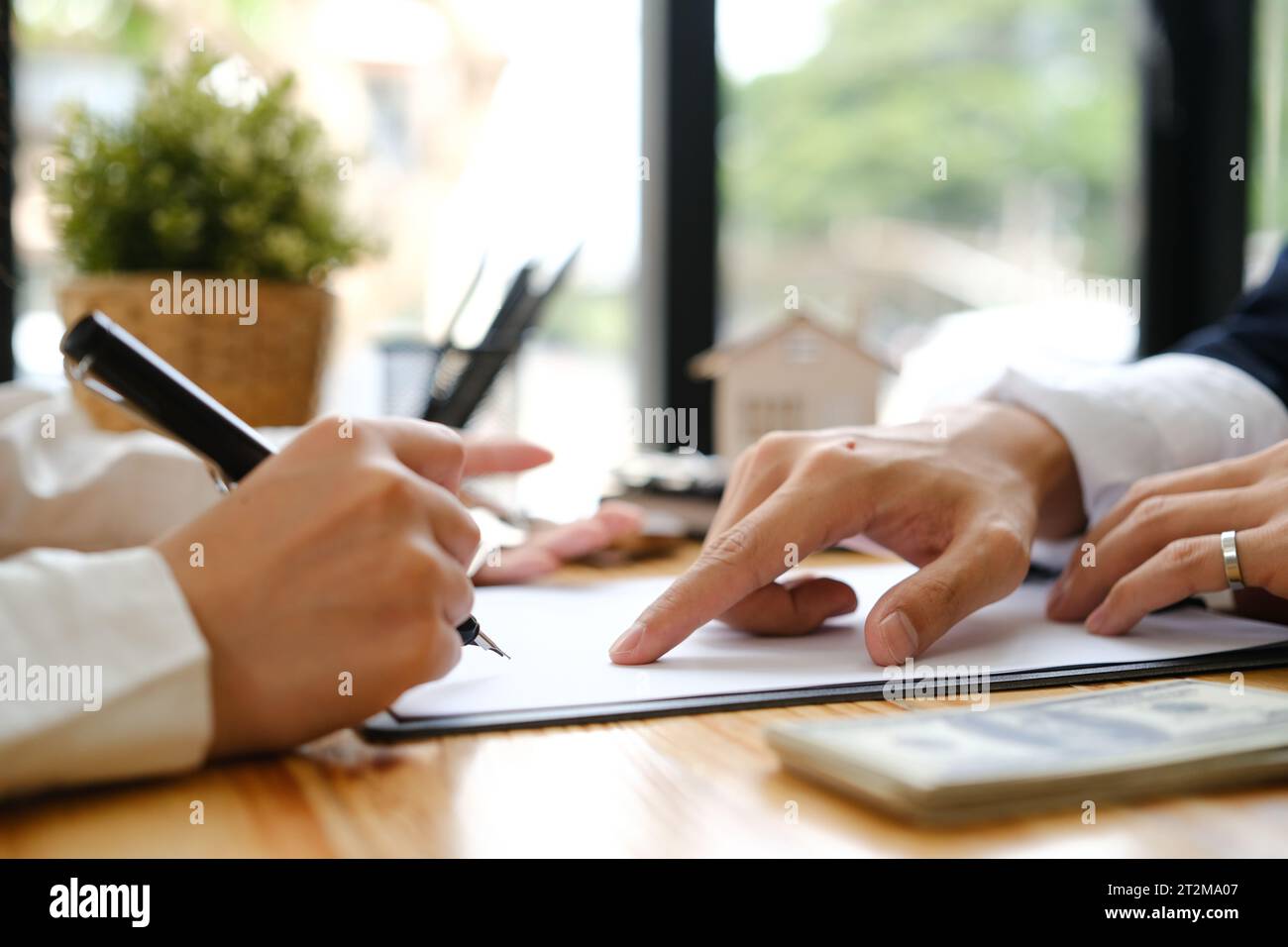 Lawyer and client discussing contract hi-res stock photography and ...