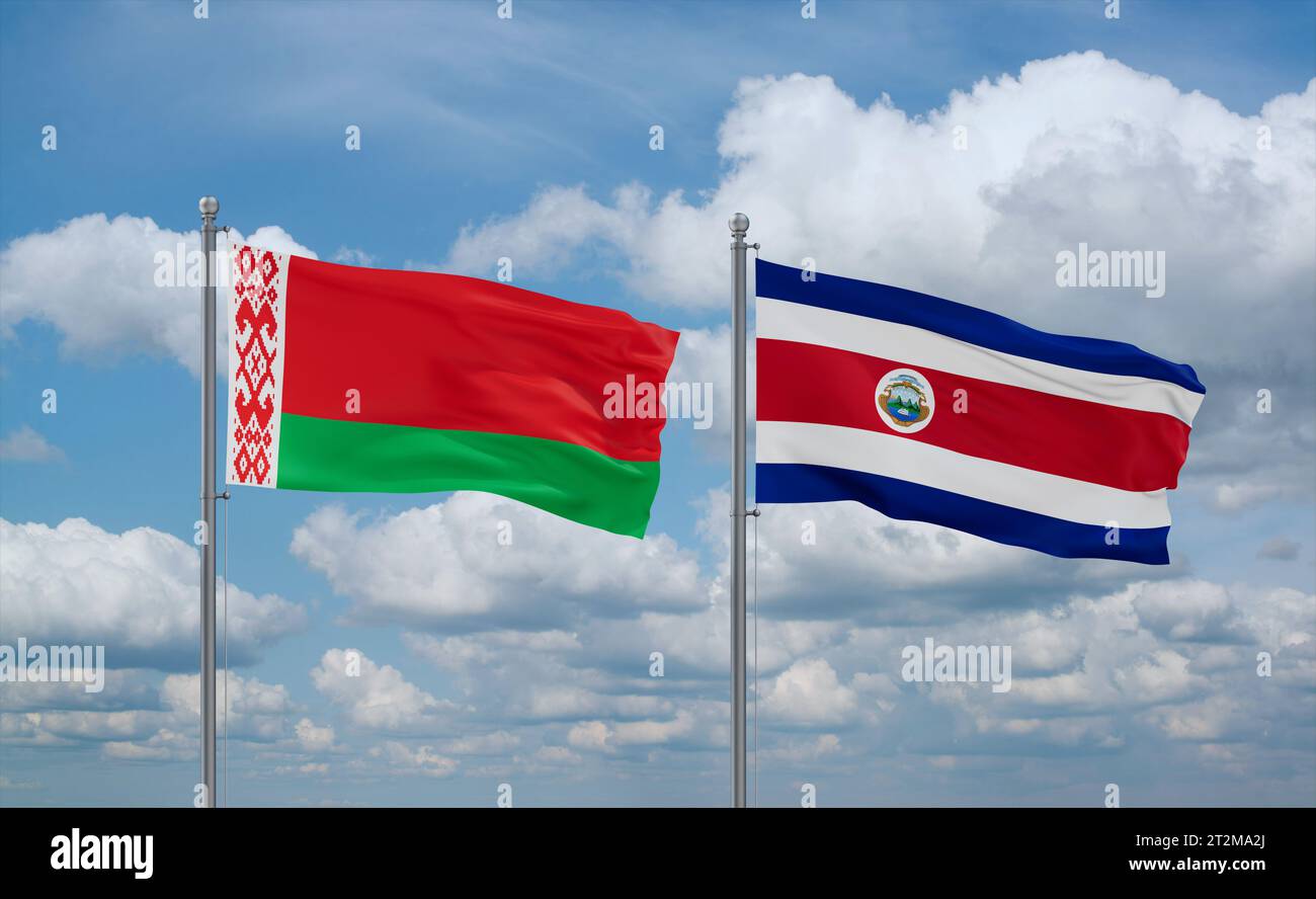 Costa Rico and Belarus flags waving together in the wind on blue cloudy ...