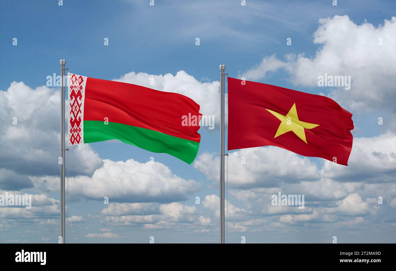 Vietnam and Belarus flags waving together in the wind on blue cloudy ...