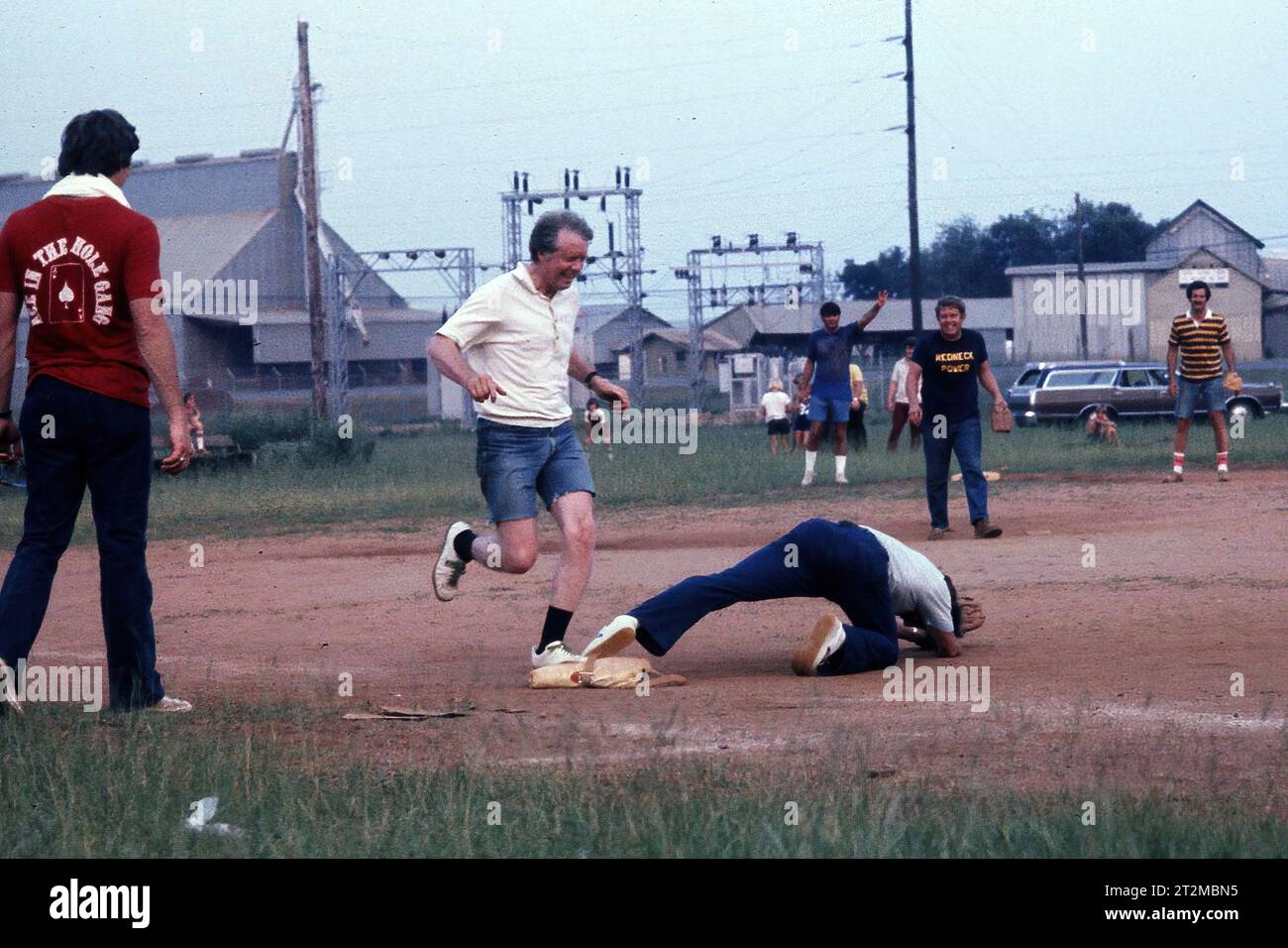 JimmyCarter  playing baseball in Plains Georgia in July 1976 There were two teams ZI thgink Carter and Secret Service vs the press Stock Photo