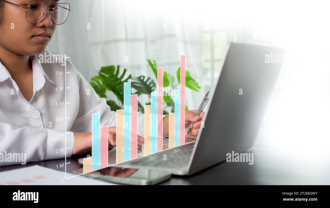 Businesswoman use computers to analyze business and manage corporate ...