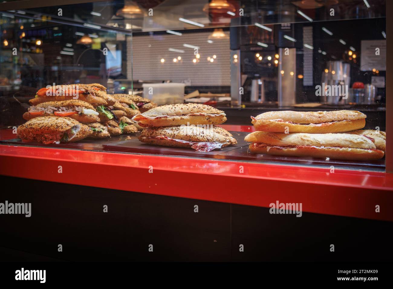 in the display of a bakery are various bread for sale Stock Photo - Alamy