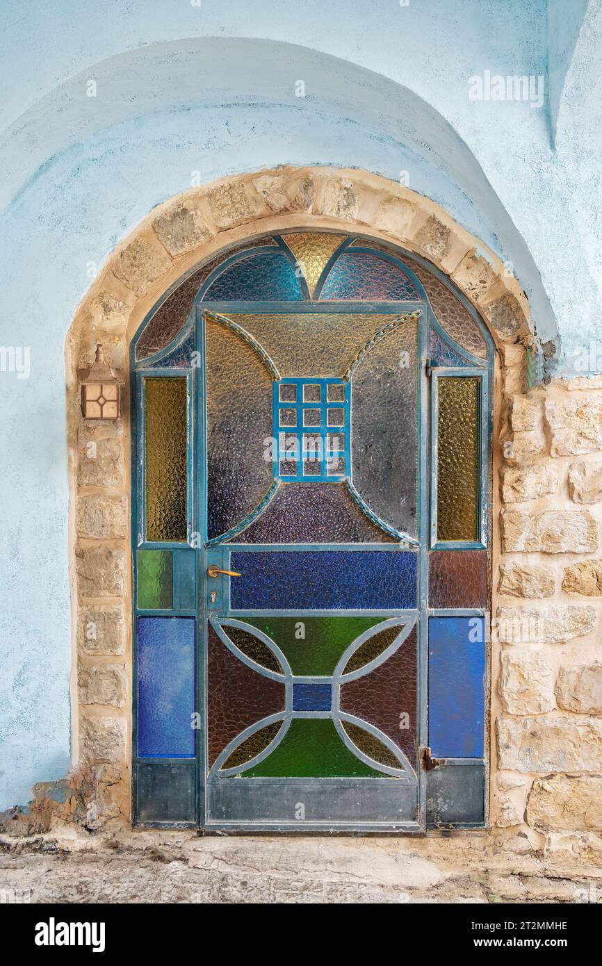 An ancient abandoned door in the old city of Tzfat Israel Stock Photo