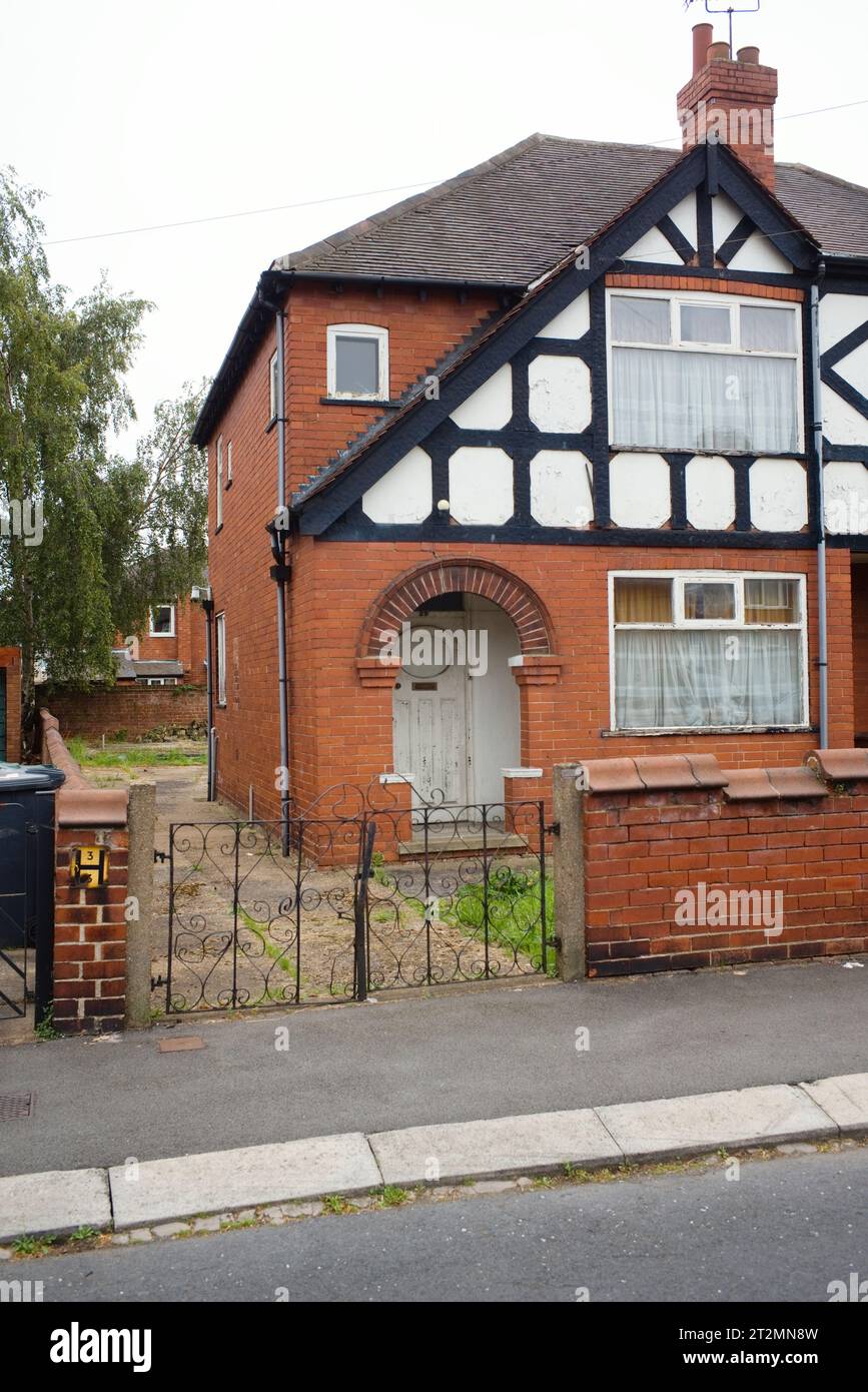 A run down semi detached 1930s house with original front door in Doncaster Stock Photo
