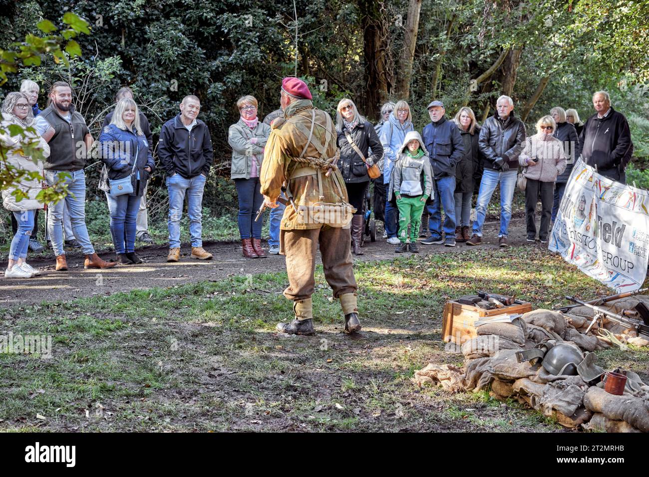 Army demonstration by a British soldier to gathered audience. 1940s WW2 reenactment England UK Stock Photo