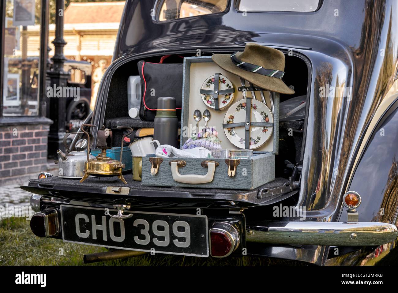 Vintage Picnic hamper and vintage car. Day out. 1940s England UK Stock