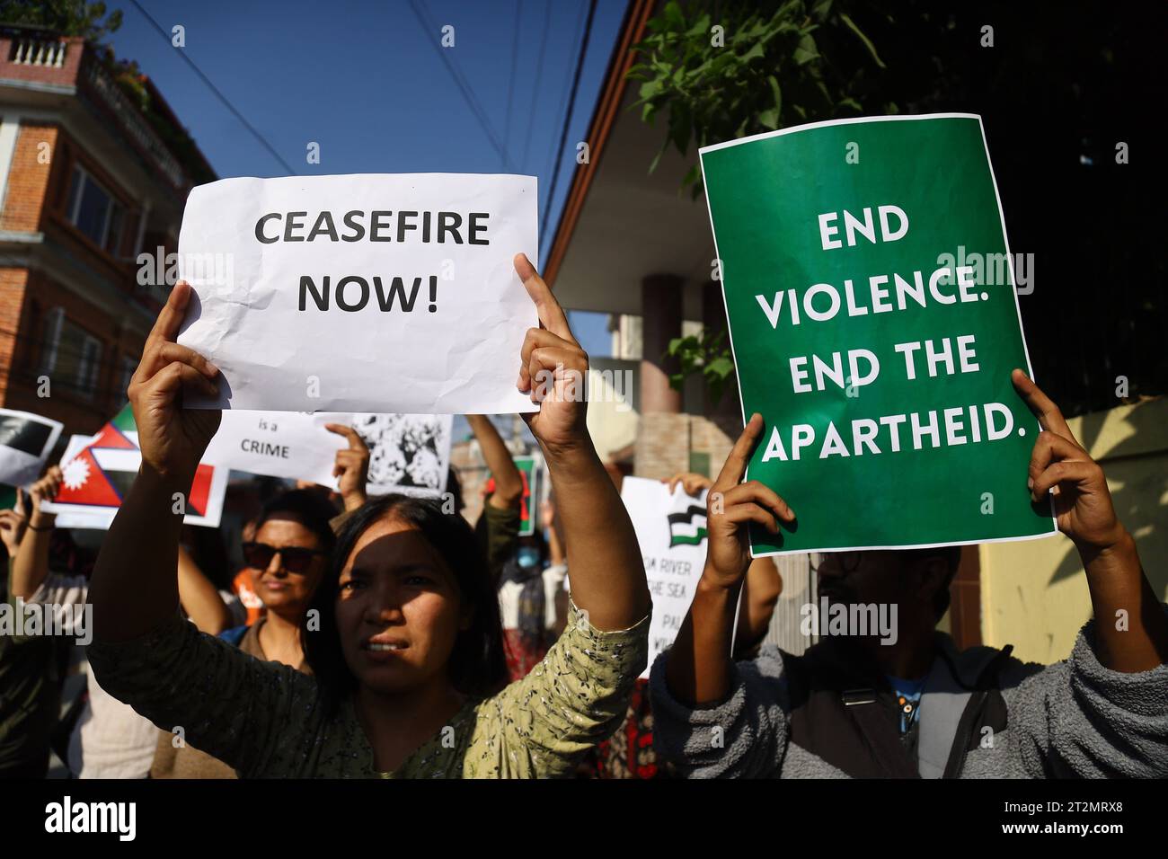 Dozens march in Nepal in support of Palestine Nepali activists display placards demanding Israel