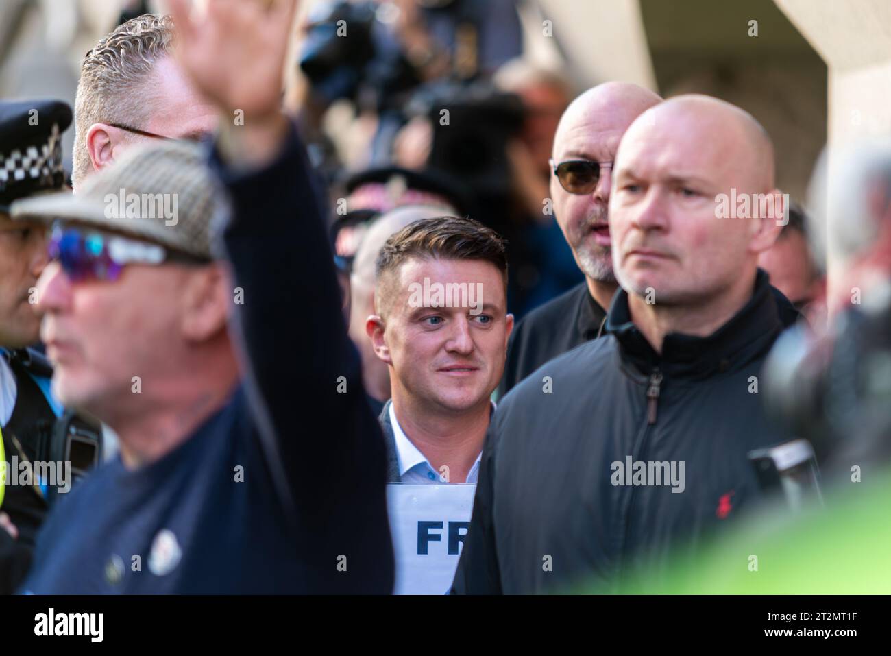 Tommy Robinson appeared in the Central Criminal Court (Old Bailey), London accused of contempt of court. Leaving court, with associates Stock Photo