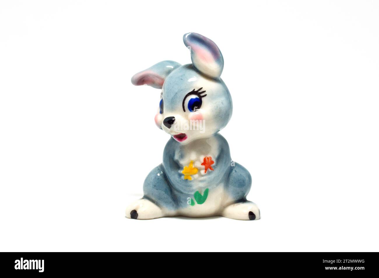 Close up of a Wade Whimsie porcelain figurine of Thumper the rabbit from Disney's animated movie Bambi, isolated against a white background. Stock Photo