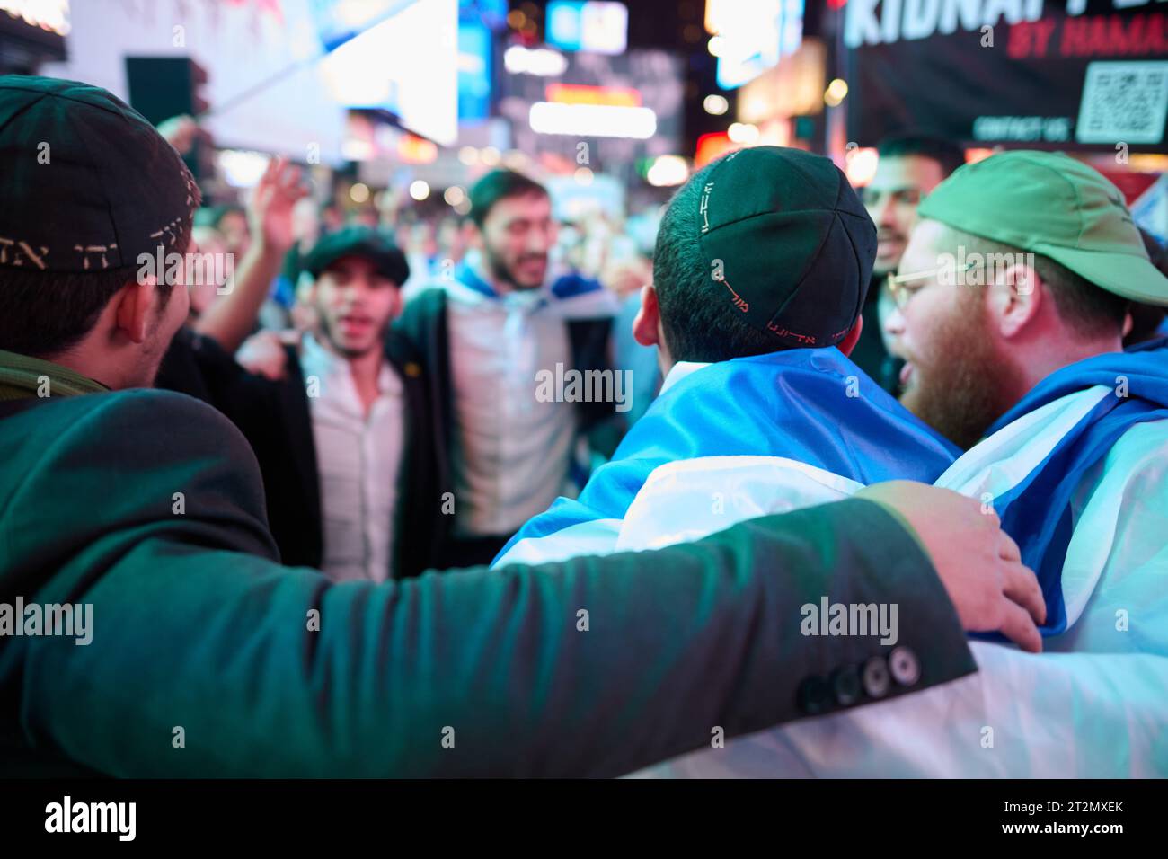 New York, New York, USA. 19th Oct, 2023. Young men dance in a circle ...